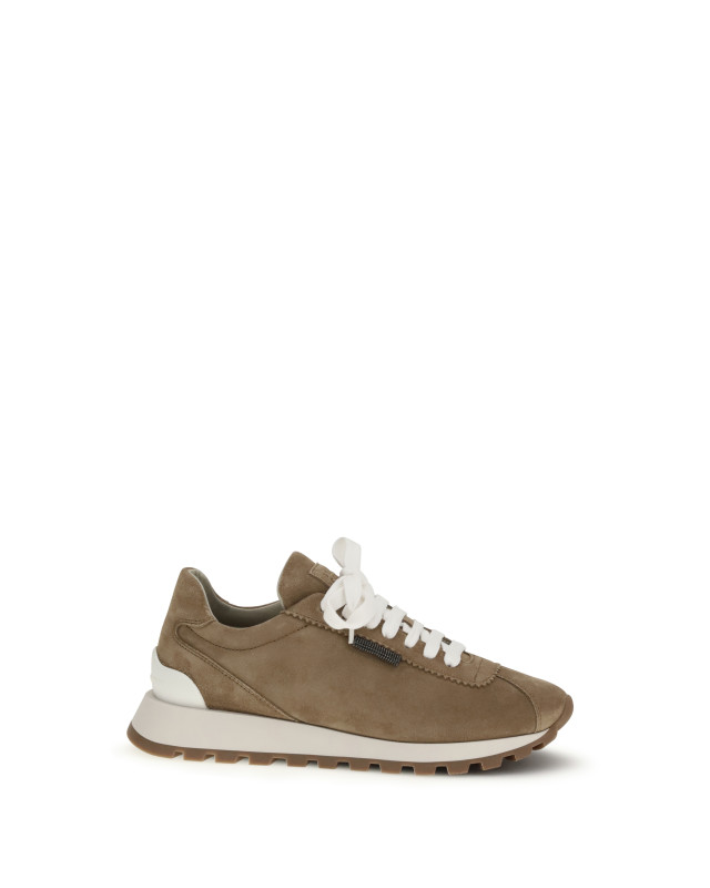 Sneakers with iconic embellishments