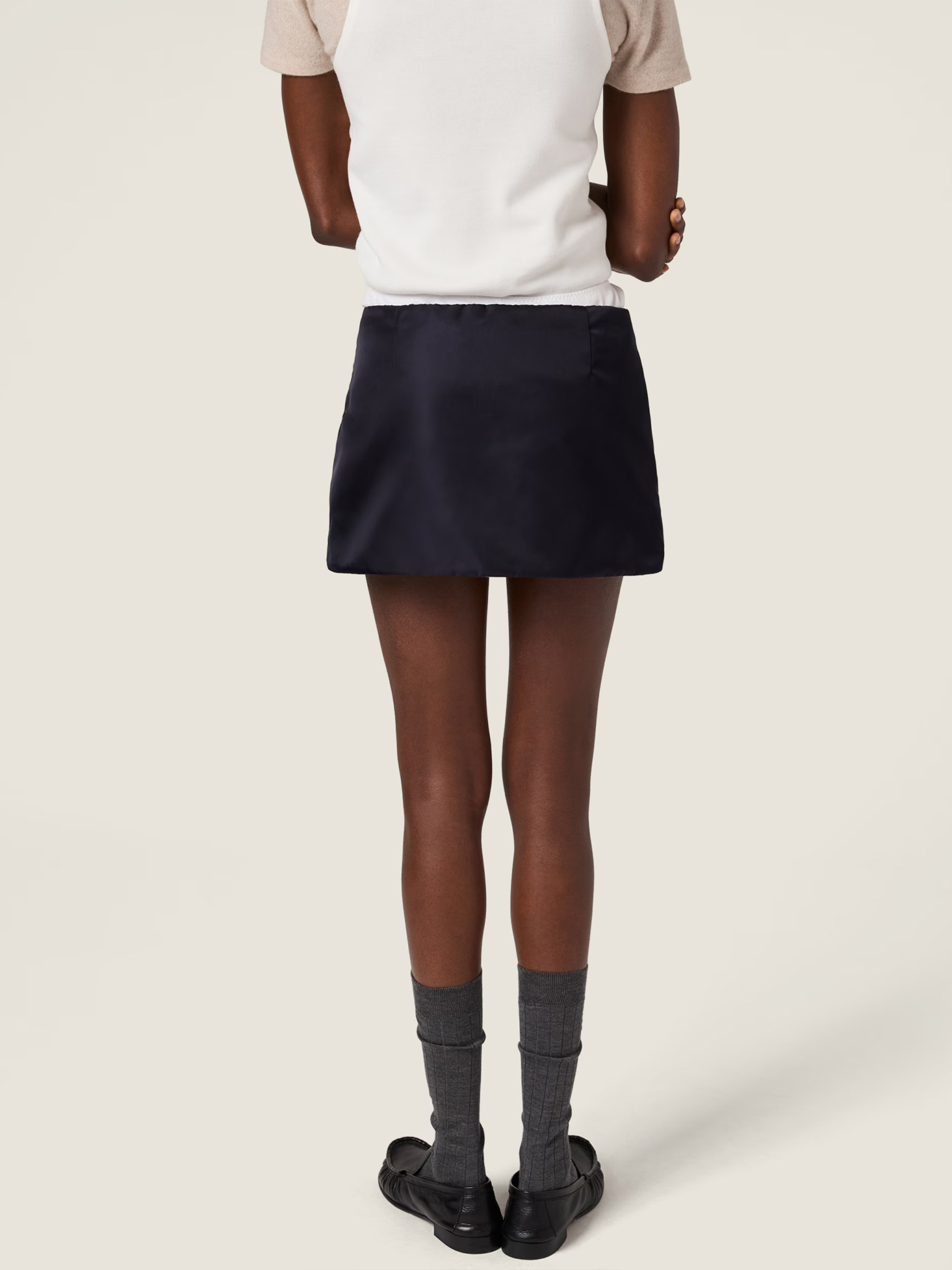 [Miu Miu] Mini skirt FW26 MG2583 181A
