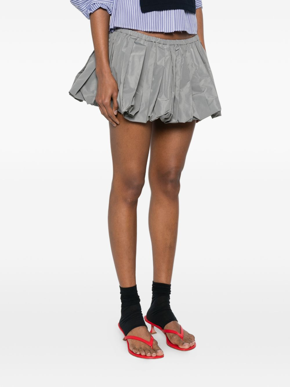 [Miu Miu] Mini skirt FW26 MG2723121IF0112