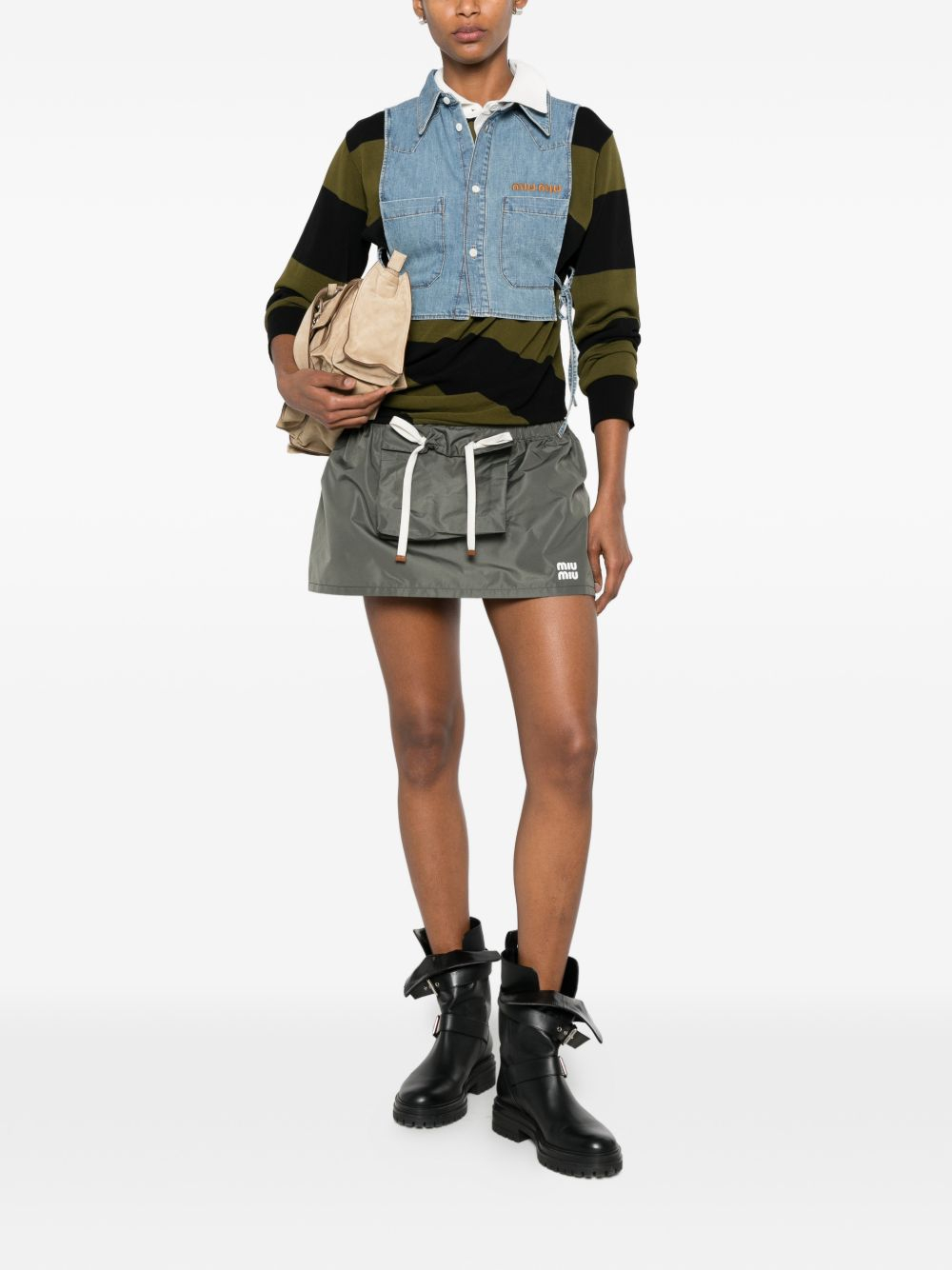 [Miu Miu] Mini skirt FW26 MG2704121IF0414