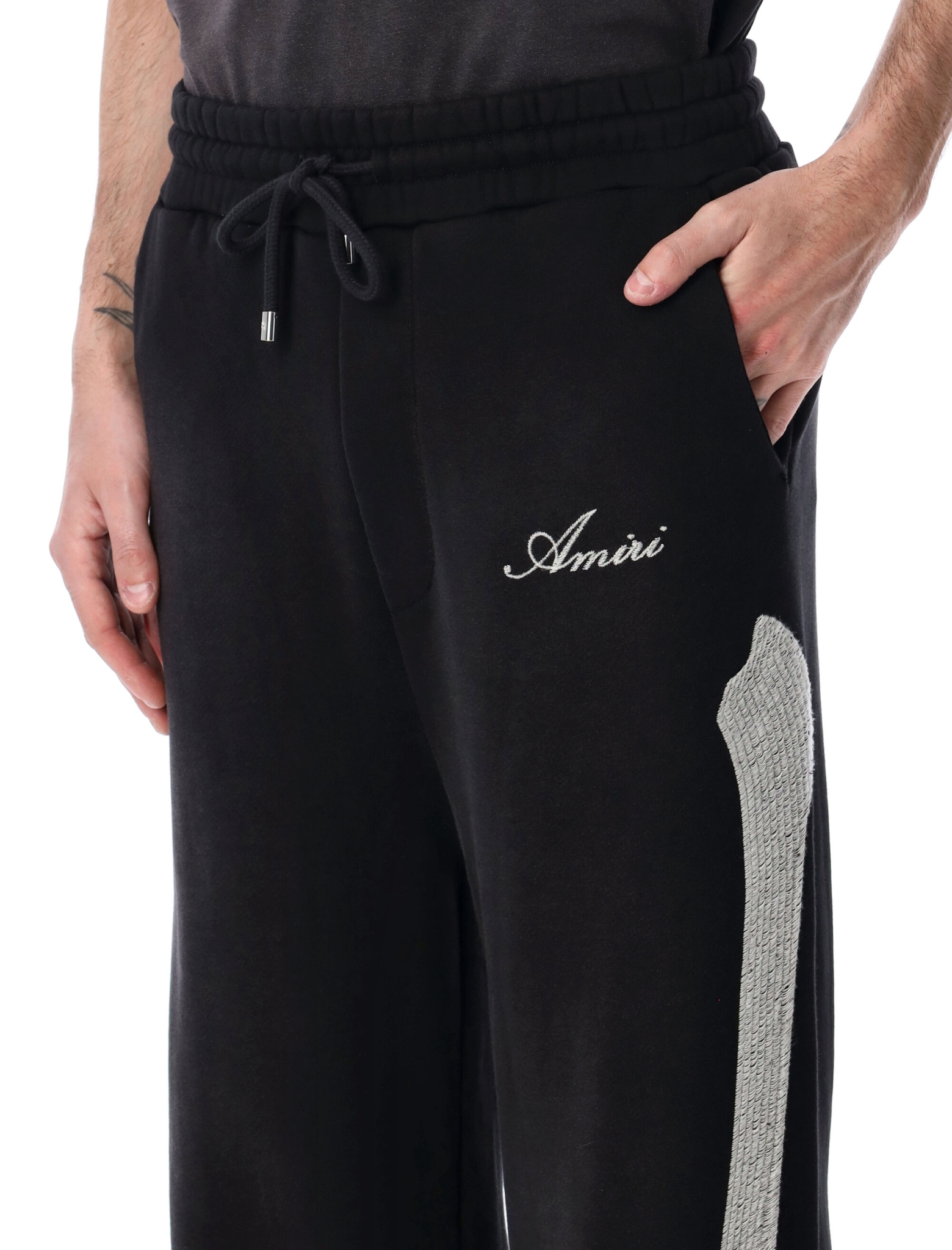[Amiri] Trousers SS26 AMBMPA1021001