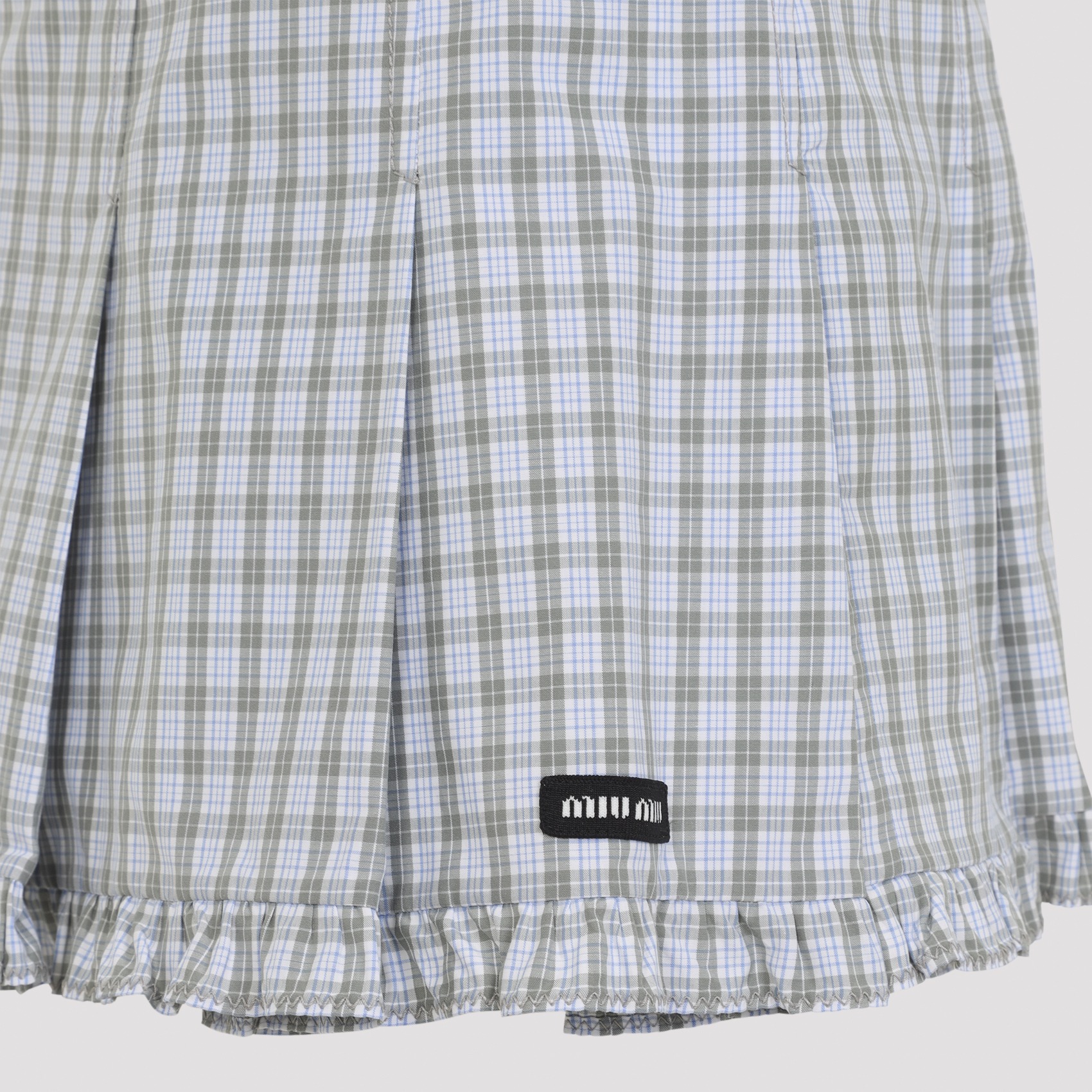 [Miu Miu] Mini skirt FW26 MG2689SOOO.196L