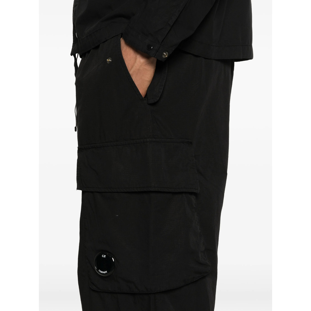 [C.P. Company] Trousers SS26 MPA248A00 6272G 999