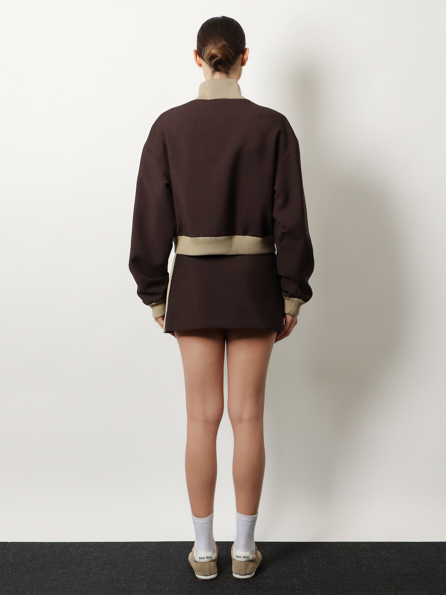[Miu Miu] Mini skirt FW26 MG2724SOOO12I1F0324
