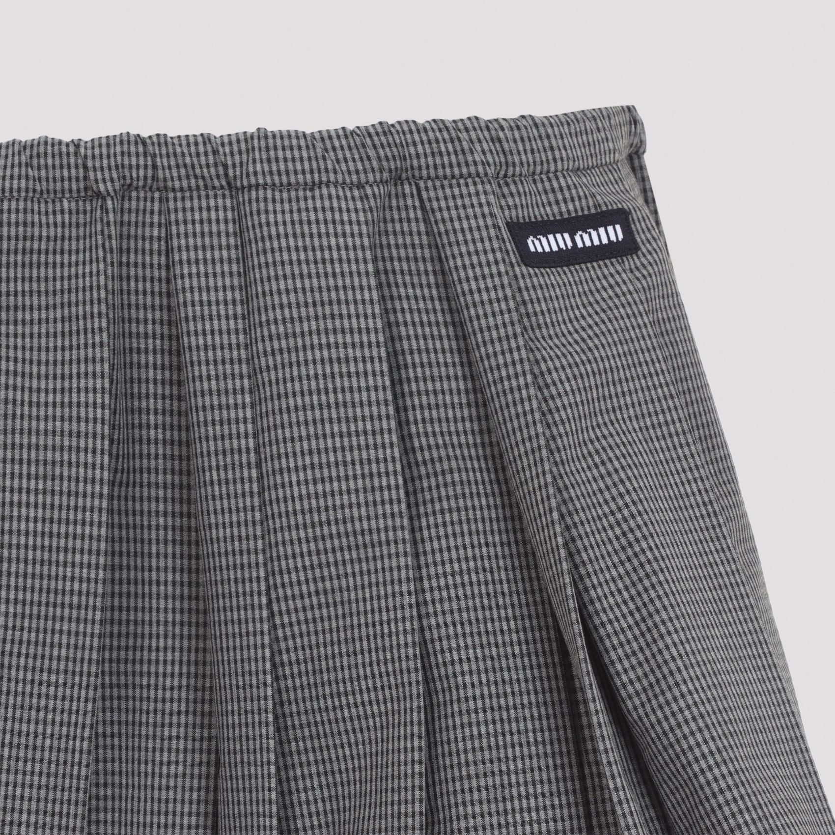 [Miu Miu] Mini skirt FW26 MG2723SOOO.19OS