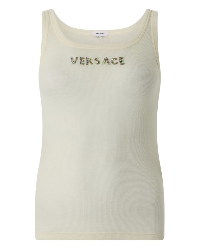 Top with sequined writing