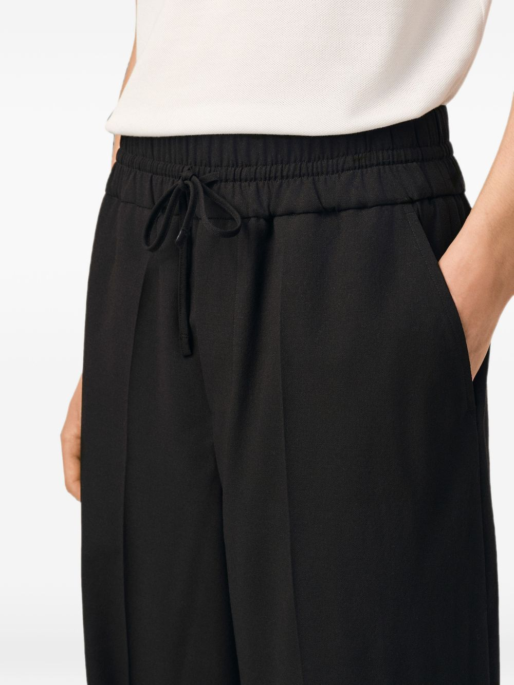 [Ami Paris] Trousers FW26 UTR918WV0211001