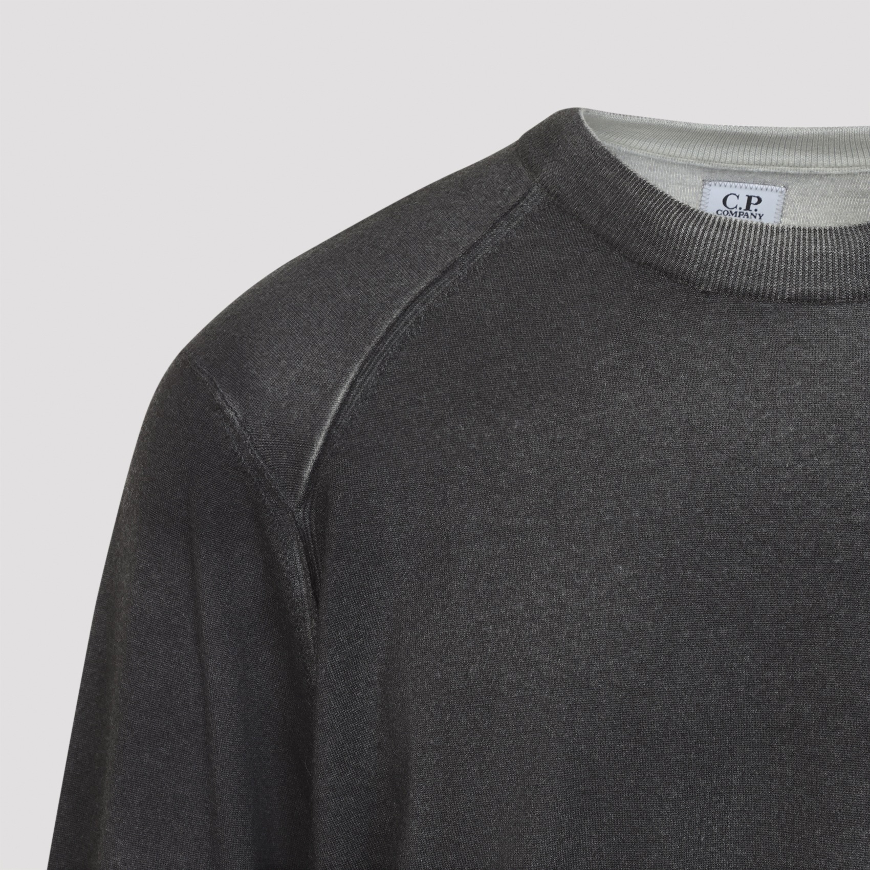 [C.P.COMPANY] Knitwear FW26 21CMKN046A.003247S