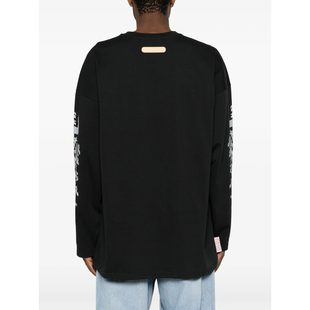 [PDF] T-shirts Long Sleeve FW26 DFM54058 TJ101GR04C BLACK