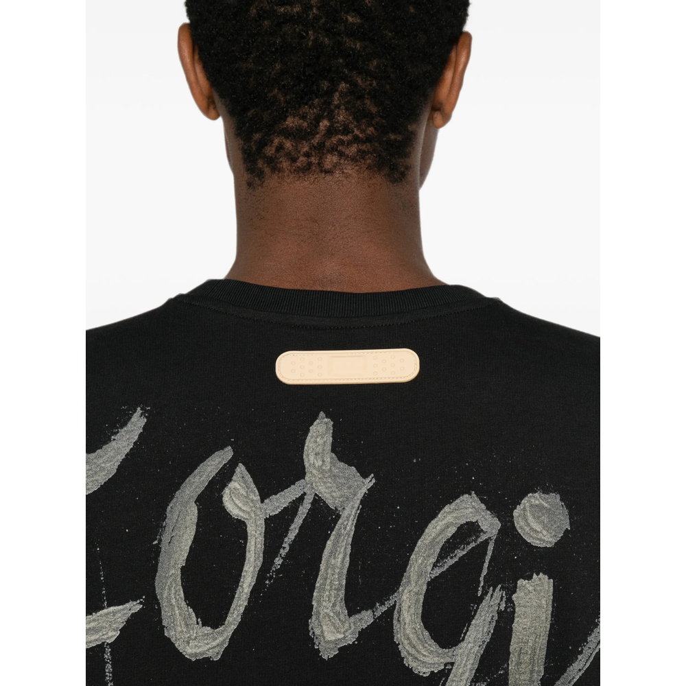[PDF] T-shirts Short Sleeve FW26 DFM54058 TJ101GR04A BLACK