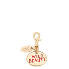 Dog charm in brass