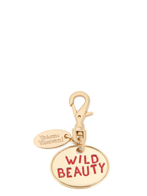 Dog charm in brass