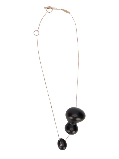 Necklace with pendant in metal and ebony wood