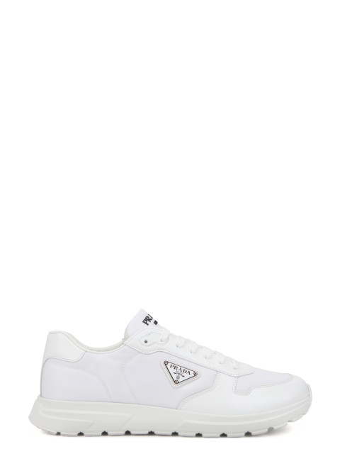 Sneakers in fabric with leather inserts