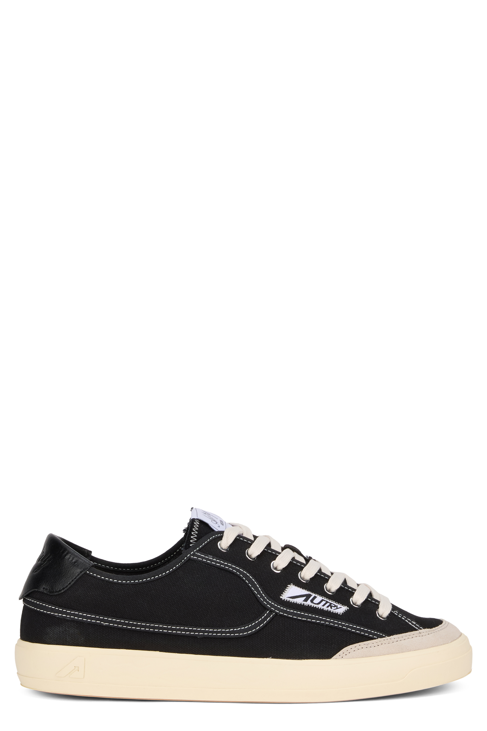 Low top sneakers in fabric with leather inserts